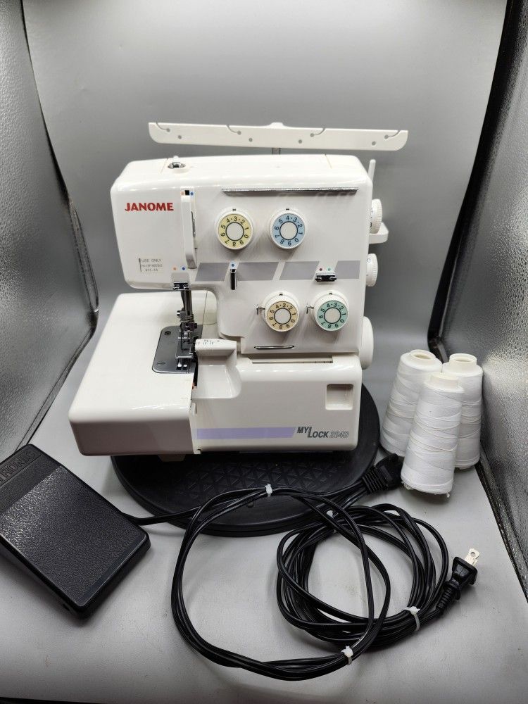 Janome MyLock 204D Serger Sewing Machine with Foot Pedal AND ORIGINAL BOX IN GREAT WORKING CONDITION