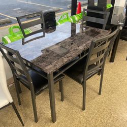 Table And 4 Chairs 