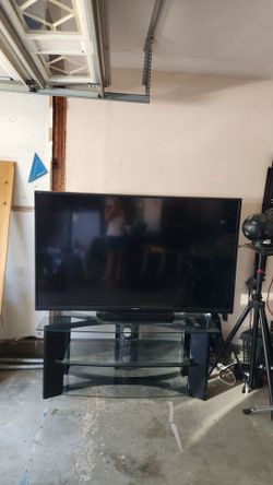 65 in TV and stand