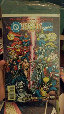 DC versus Marvel whole set one through 4, 1 and 3 are signed by all three artist and number three is signed by one of the artists