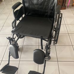 Wheelchair with elevated footrest 