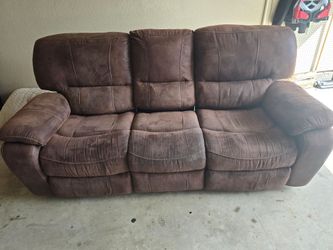 Brown couch and Love seat
