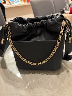 Bandolier Celeste drawstring black/gold bag