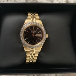 Black And Gold Citizen Watch