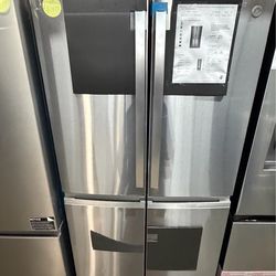 Ge profile 4 door refrigerator with ice and water duel dispenser