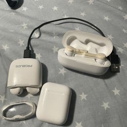 Three Earbud Pods With Broken Earbuds And One Charging Cable 