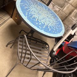 Bistro table with 2 chairs, kids slide, playmat, pack n play, stroller, peg perego high chair, metal shelving