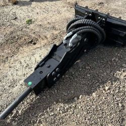 Mini Skidster jackhammer attachment