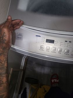 (Not draining all the water out,  n doesn't spin)  TopLoad Washing Machine