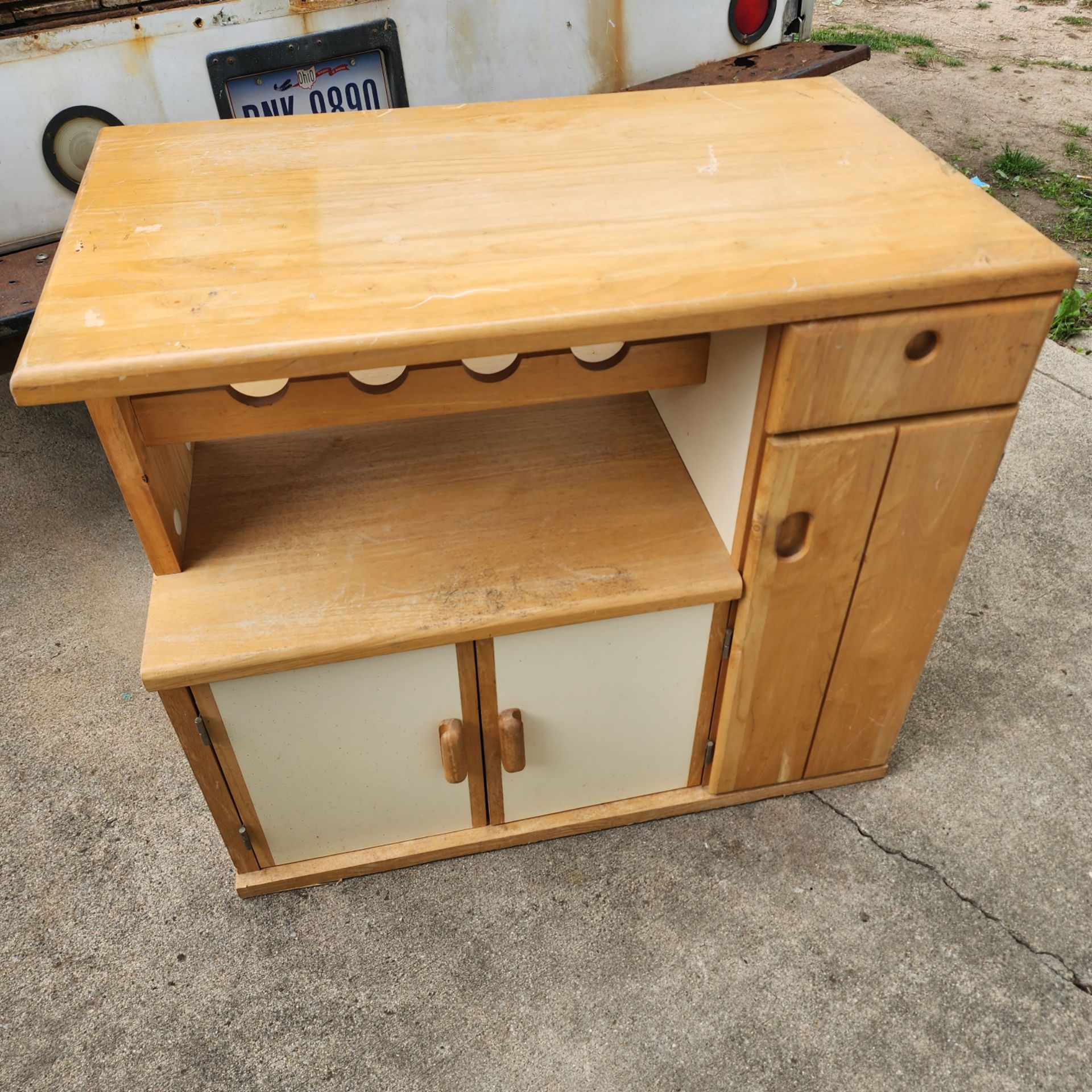 Kitchen work storage and wine cart they have three open departments you can put your wine on it it's solid o it do not have wheels it's in very good c