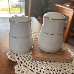 Porcelain Salt And Pepper Shakers With Gold And Feather Design On Side. 