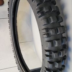 Motocross Dunlop tire. ( Size: 3.00 X 21 or Metric Size: 90/90-21.