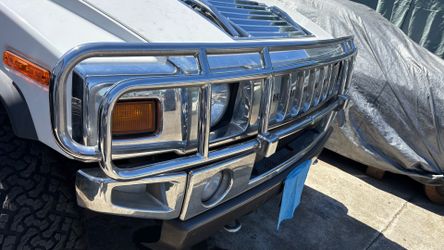 Hummer h2 chrome front brush guard and taillights guard.