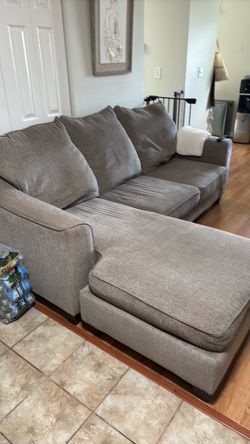 L sectional couch neutral brown grey color