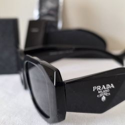 PRADA Luxury/Designer Sunglasses.   Condition is New with paperwork, Case and Box