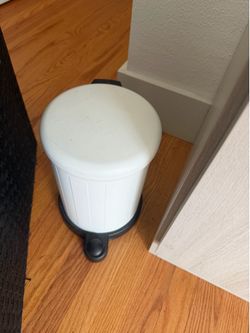 Small white trash can
