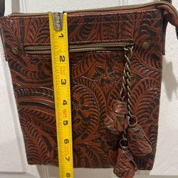 Maurice’s brown floral embossed crossbody bag
