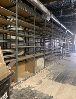 Shelving. Two rows 150ft long 12’high