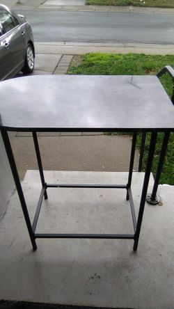 Table nook with rod iron legs