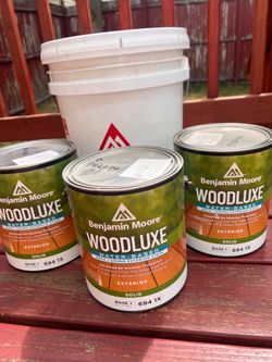 4 Sealed Gallons of Benjamin Moore Paint - $250