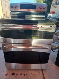 STOVE  DOUBLE OVENS CONVENTION GE  PROFILE ELECTRIC EVERTING WORKS VERY CLEANING DELIVERY AND INSTALLATION AVAILABLE