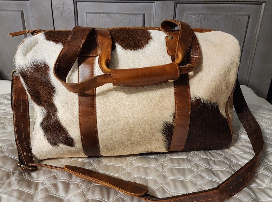 COWHIDE DUFFLE BAG