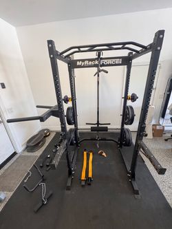 FORCE USA Squat Rack +lat pull down station ), Adjustable Bench, dumbells (and racks), 45lb barbell, 260lbs Olympic bumper plates, & all accessories