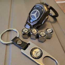 Mercedes Benz valve stem covers, push button engine start cover, & Key chain.