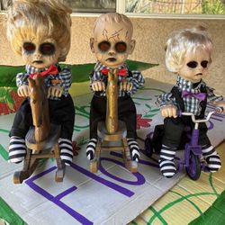Set Of 3 creepy Dolls On Rocking Chairs & Tricycle 