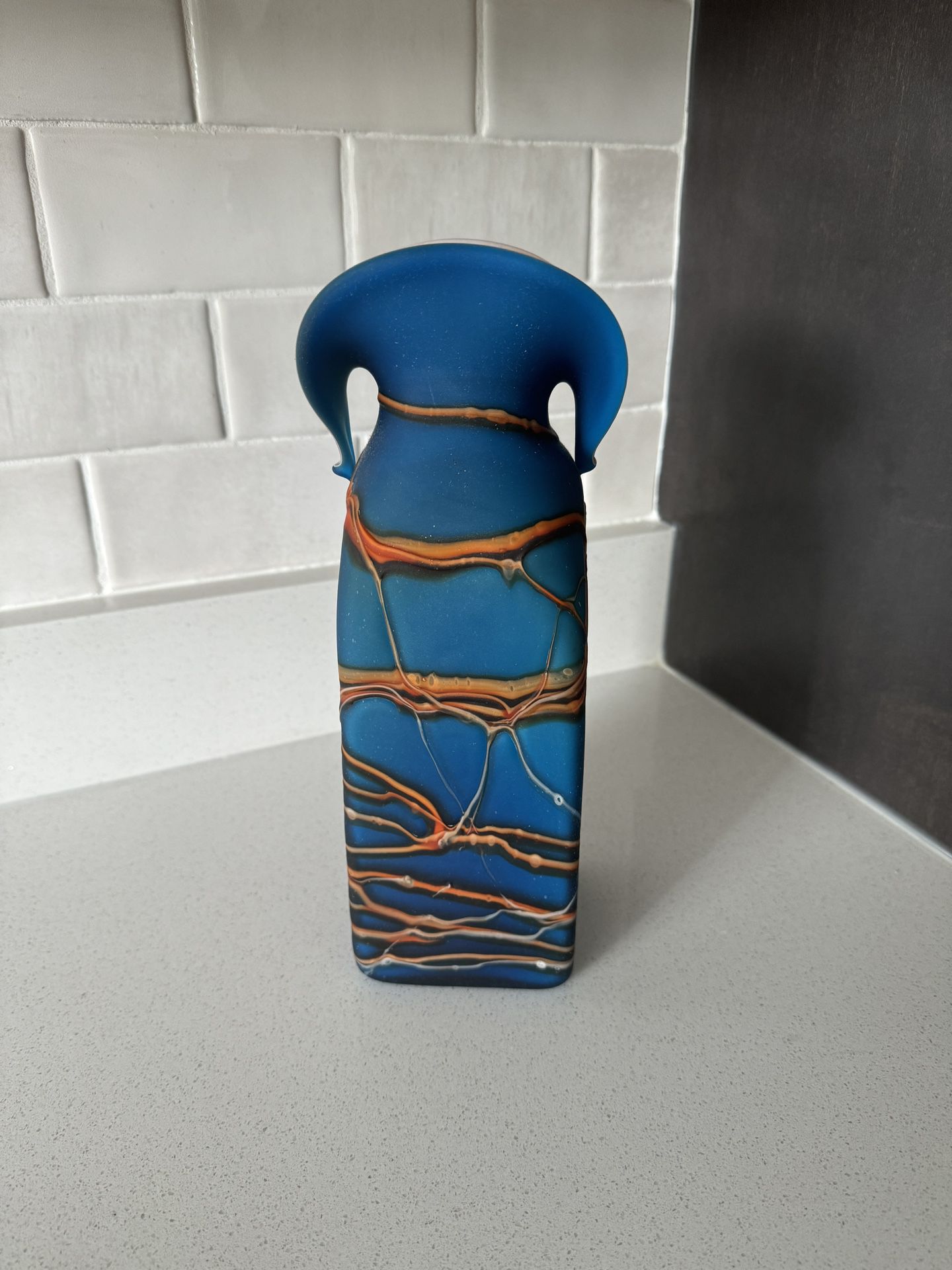 Blue Glass Vase With Intricate Orange ”Lava” Lines Throughout