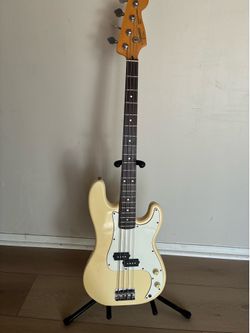 Vintage 1989 Squier E series Korean Precision Bass cream off white.