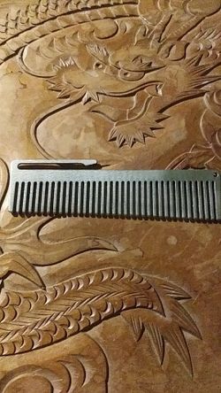 Titanium comb