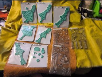 True collectible 10 Julie nutting rubber stamp paper dolls will not separate.