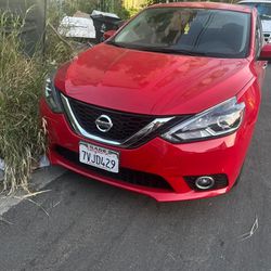 Red Nissan Sentra (2016)