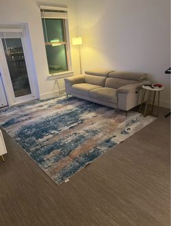 Power Reclining Loveseat couch + FREE Rug(moving out offer)