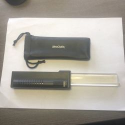 Ultra Optics multi purpose pull out type clear magnifier with light & carrying case. Like new good working condition