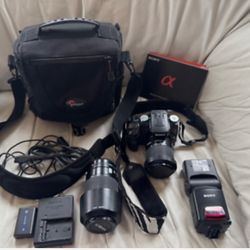 Sony Alpha a100 10.2MP Digital SLR Camera - Black multiple lenses and accessorie