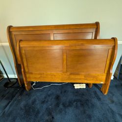 Queen Size Bed Frame.  Vintage Solid Heavy Wood.  Sleigh Bed.  Side Board/Rails Also Included .