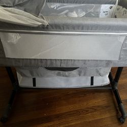 Baby Bassinet With Baby Items  