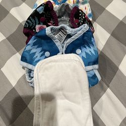 Assorted Cloth Diapers And Accessories