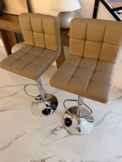 2 Adjustable counter stool.