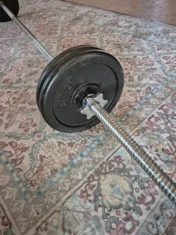 Barbell and 4x10 lbs weights **PENDING