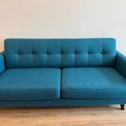 Living Spaces Blue Loveseat Couch