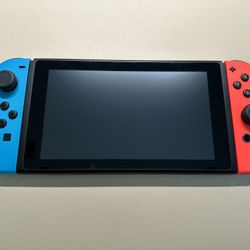 Pre-owned Nintendo Switch & Pro Controller