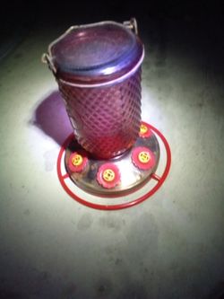 Glass hummingbird feeder