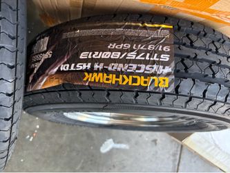 2 trailer wheel chrome with tire. $200