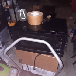 Small Black Working Microwave 