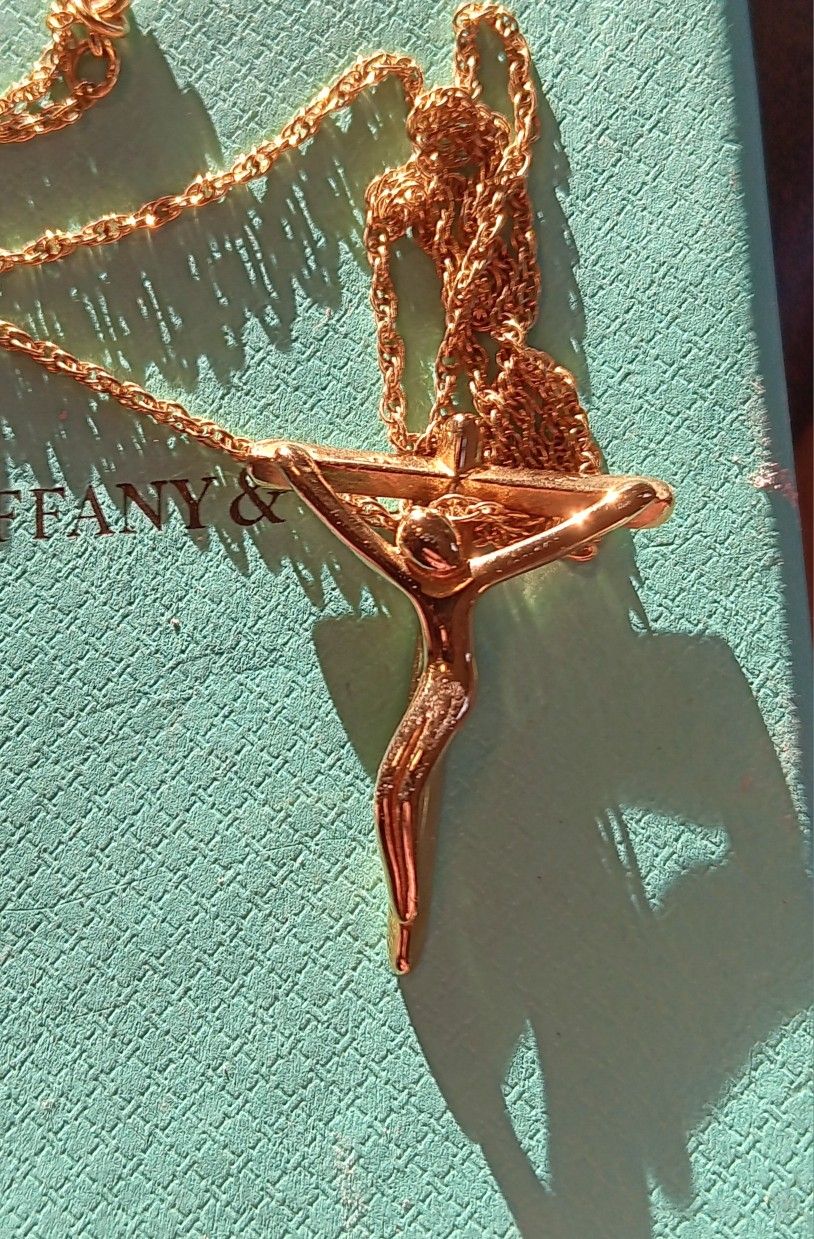 Stamped 750 (18kt) Tiffany Gold Crucifix  Elsa Paretti