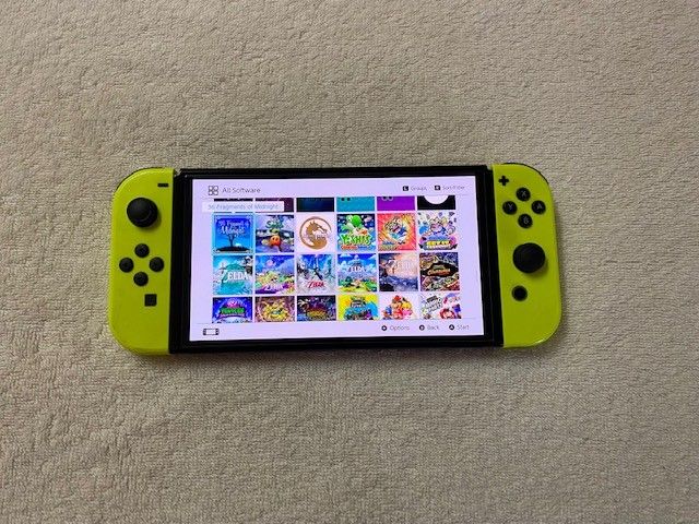SWITCH OLED with 512GB/MODD and 125 GAMES