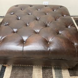 Ashley Large Brown Couch Ottoman Wood Feet 39” W x 18” H *material seperating at stiching design